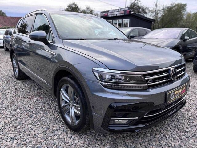 Серый Фольксваген Тигуан, объемом двигателя 2 л и пробегом 100 тыс. км за 24999 $, фото 2 на Automoto.ua