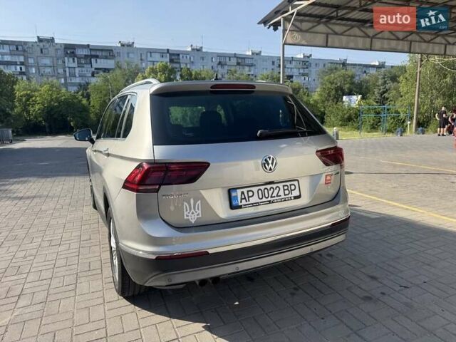 Серый Фольксваген Тигуан, объемом двигателя 1.97 л и пробегом 111 тыс. км за 32000 $, фото 2 на Automoto.ua