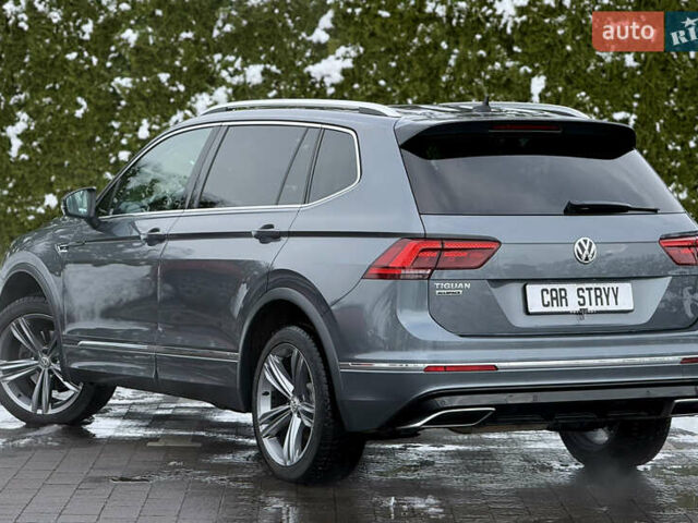 Серый Фольксваген Тигуан, объемом двигателя 2 л и пробегом 241 тыс. км за 26999 $, фото 2 на Automoto.ua