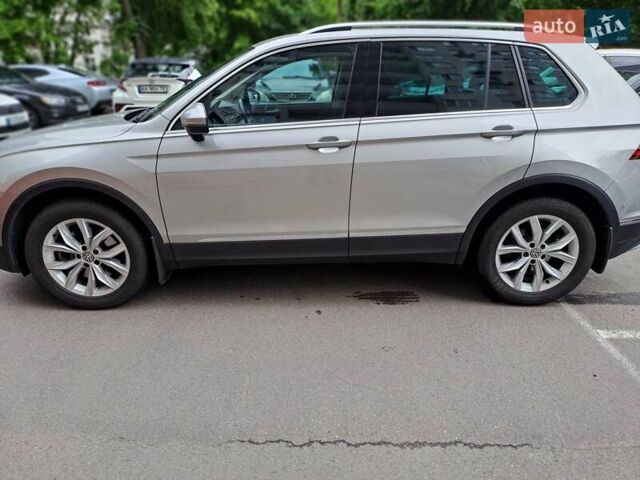 Сірий Фольксваген Тігуан, об'ємом двигуна 2 л та пробігом 77 тис. км за 30900 $, фото 6 на Automoto.ua