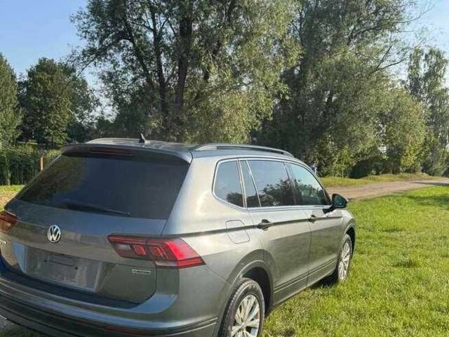 Сірий Фольксваген Тігуан, об'ємом двигуна 2 л та пробігом 103 тис. км за 13000 $, фото 2 на Automoto.ua