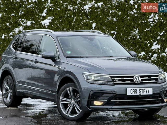 Серый Фольксваген Тигуан, объемом двигателя 2 л и пробегом 241 тыс. км за 26999 $, фото 1 на Automoto.ua