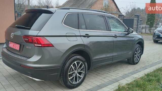 Сірий Фольксваген Тігуан, об'ємом двигуна 1.98 л та пробігом 179 тис. км за 17300 $, фото 1 на Automoto.ua