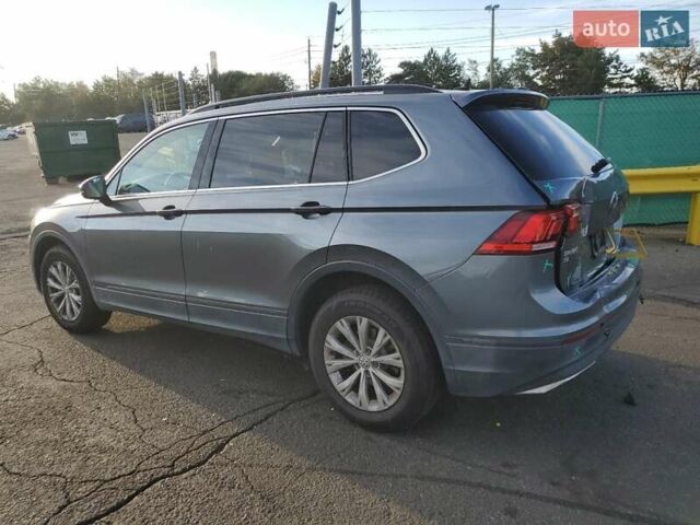 Сірий Фольксваген Тігуан, об'ємом двигуна 2 л та пробігом 154 тис. км за 4800 $, фото 1 на Automoto.ua