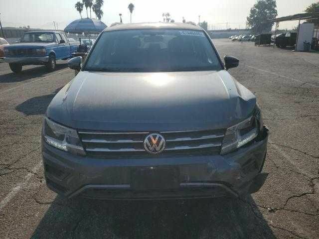 Серый Фольксваген Тигуан, объемом двигателя 2 л и пробегом 49 тыс. км за 4500 $, фото 4 на Automoto.ua