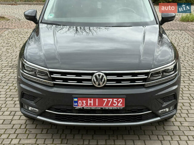Серый Фольксваген Тигуан, объемом двигателя 2 л и пробегом 143 тыс. км за 29500 $, фото 17 на Automoto.ua