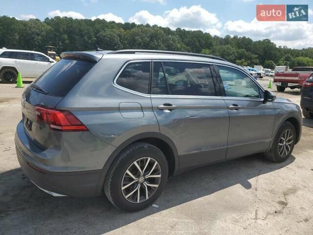 Серый Фольксваген Тигуан, объемом двигателя 2 л и пробегом 104 тыс. км за 4200 $, фото 2 на Automoto.ua