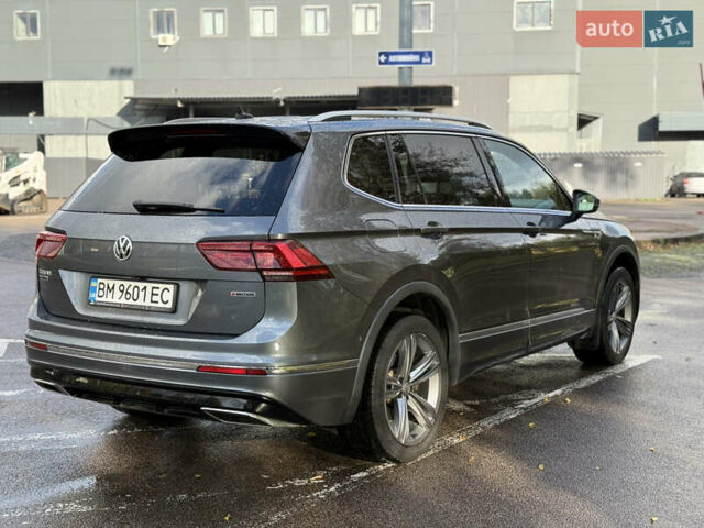 Серый Фольксваген Тигуан, объемом двигателя 2 л и пробегом 295 тыс. км за 25900 $, фото 3 на Automoto.ua