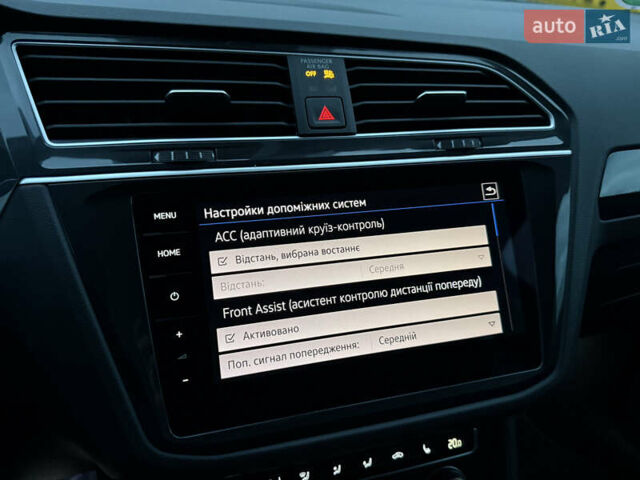 Серый Фольксваген Тигуан, объемом двигателя 2 л и пробегом 143 тыс. км за 29500 $, фото 46 на Automoto.ua