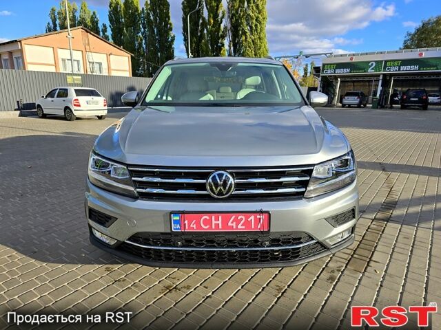 Сірий Фольксваген Тігуан, об'ємом двигуна 2 л та пробігом 147 тис. км за 21950 $, фото 5 на Automoto.ua