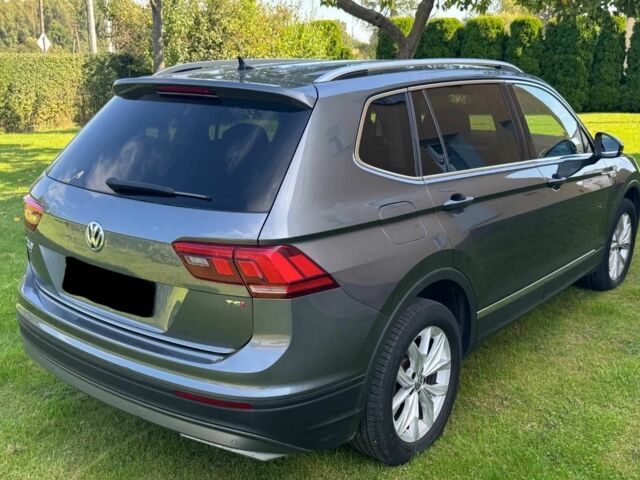 Сірий Фольксваген Тігуан, об'ємом двигуна 2 л та пробігом 35 тис. км за 13100 $, фото 2 на Automoto.ua