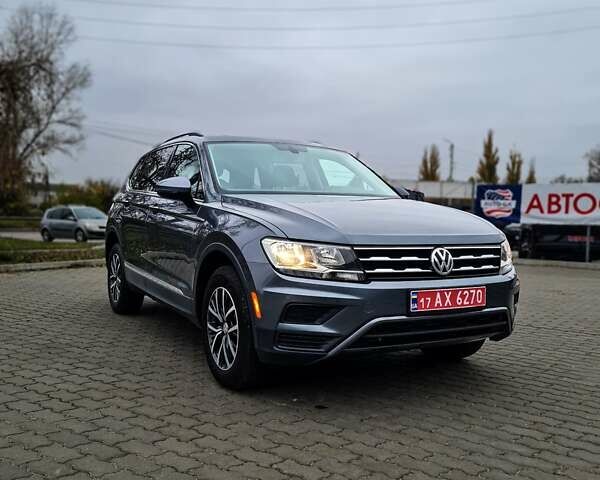 Серый Фольксваген Тигуан, объемом двигателя 2 л и пробегом 122 тыс. км за 20500 $, фото 1 на Automoto.ua