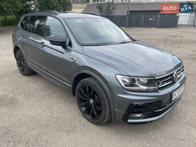 Серый Фольксваген Тигуан, объемом двигателя 1.98 л и пробегом 129 тыс. км за 23000 $, фото 1 на Automoto.ua