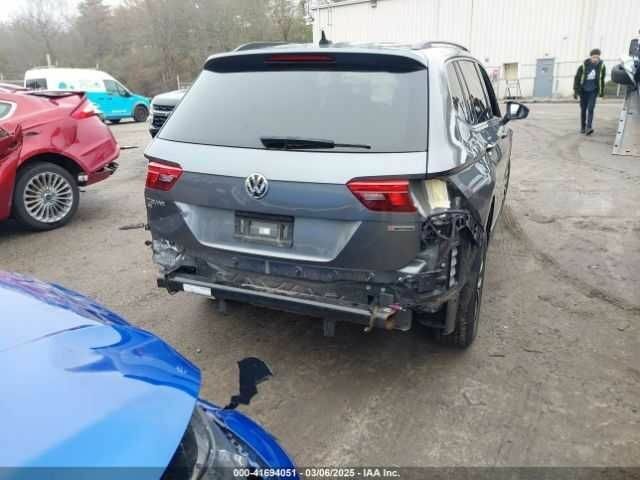 Серый Фольксваген Тигуан, объемом двигателя 2 л и пробегом 59 тыс. км за 4000 $, фото 5 на Automoto.ua