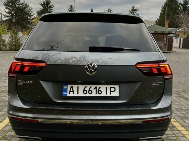 Серый Фольксваген Тигуан, объемом двигателя 2 л и пробегом 98 тыс. км за 22000 $, фото 3 на Automoto.ua