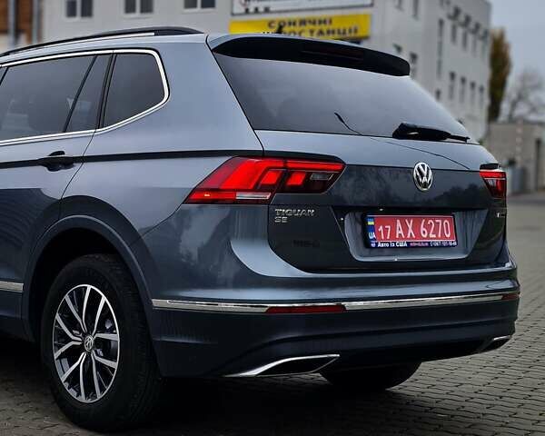 Серый Фольксваген Тигуан, объемом двигателя 2 л и пробегом 122 тыс. км за 20500 $, фото 4 на Automoto.ua