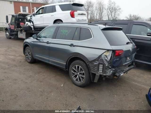 Серый Фольксваген Тигуан, объемом двигателя 2 л и пробегом 59 тыс. км за 4000 $, фото 2 на Automoto.ua