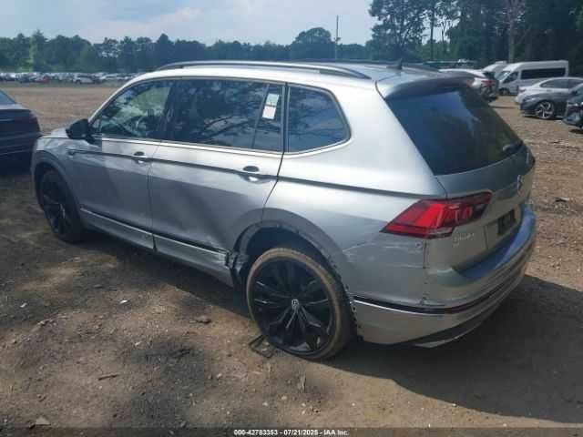 Сірий Фольксваген Тігуан, об'ємом двигуна 2 л та пробігом 32 тис. км за 4500 $, фото 2 на Automoto.ua