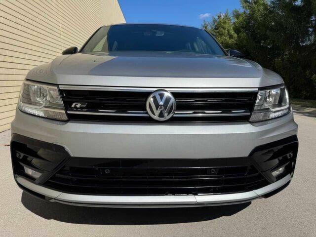 Серый Фольксваген Тигуан, объемом двигателя 2 л и пробегом 40 тыс. км за 10000 $, фото 1 на Automoto.ua