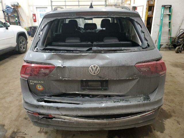 Сірий Фольксваген Тігуан, об'ємом двигуна 2 л та пробігом 138 тис. км за 11400 $, фото 4 на Automoto.ua