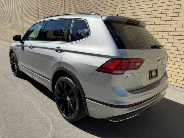 Серый Фольксваген Тигуан, объемом двигателя 2 л и пробегом 40 тыс. км за 10000 $, фото 5 на Automoto.ua