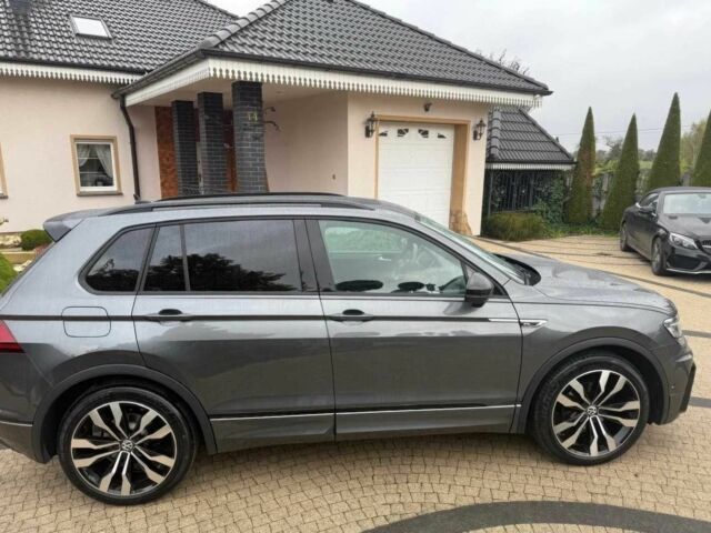 Сірий Фольксваген Тігуан, об'ємом двигуна 2 л та пробігом 55 тис. км за 19000 $, фото 4 на Automoto.ua