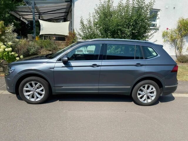 Сірий Фольксваген Тігуан, об'ємом двигуна 2 л та пробігом 33 тис. км за 18000 $, фото 3 на Automoto.ua