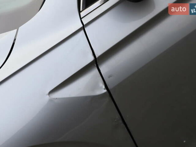 Сірий Фольксваген Тігуан, об'ємом двигуна 1.98 л та пробігом 110 тис. км за 11899 $, фото 13 на Automoto.ua