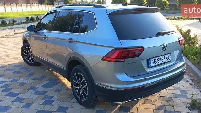 Сірий Фольксваген Тігуан, об'ємом двигуна 1.98 л та пробігом 210 тис. км за 17000 $, фото 9 на Automoto.ua