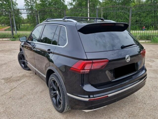 Серый Фольксваген Тигуан, объемом двигателя 2 л и пробегом 97 тыс. км за 11000 $, фото 2 на Automoto.ua