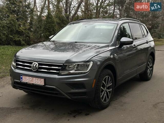 Серый Фольксваген Тигуан, объемом двигателя 2 л и пробегом 130 тыс. км за 19750 $, фото 1 на Automoto.ua