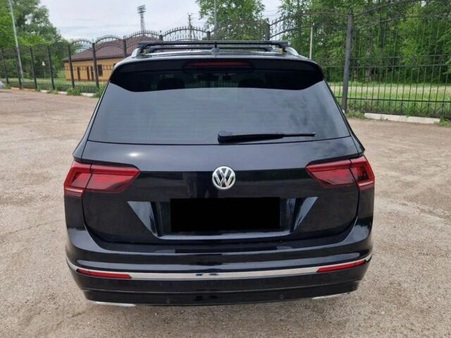 Серый Фольксваген Тигуан, объемом двигателя 2 л и пробегом 97 тыс. км за 11000 $, фото 5 на Automoto.ua