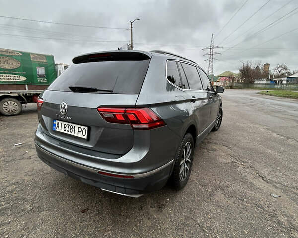 Сірий Фольксваген Тігуан, об'ємом двигуна 1.98 л та пробігом 128 тис. км за 18700 $, фото 4 на Automoto.ua
