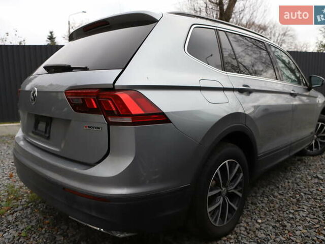 Сірий Фольксваген Тігуан, об'ємом двигуна 1.98 л та пробігом 110 тис. км за 11899 $, фото 8 на Automoto.ua