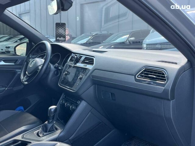 Серый Фольксваген Тигуан, объемом двигателя 2 л и пробегом 135 тыс. км за 23690 $, фото 33 на Automoto.ua