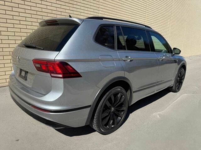 Серый Фольксваген Тигуан, объемом двигателя 2 л и пробегом 40 тыс. км за 10000 $, фото 7 на Automoto.ua