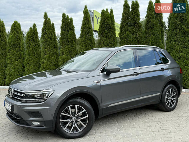 Сірий Фольксваген Тігуан, об'ємом двигуна 1.97 л та пробігом 250 тис. км за 25999 $, фото 3 на Automoto.ua