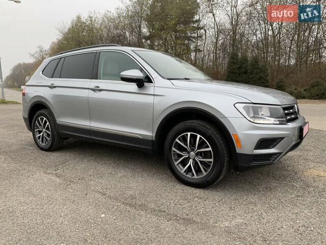 Сірий Фольксваген Тігуан, об'ємом двигуна 2 л та пробігом 130 тис. км за 20700 $, фото 1 на Automoto.ua