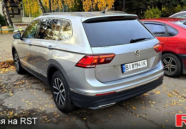 Сірий Фольксваген Тігуан, об'ємом двигуна 2 л та пробігом 122 тис. км за 25000 $, фото 4 на Automoto.ua