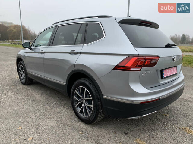 Сірий Фольксваген Тігуан, об'ємом двигуна 2 л та пробігом 130 тис. км за 20700 $, фото 4 на Automoto.ua