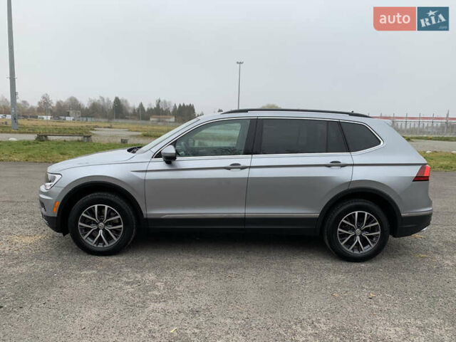 Сірий Фольксваген Тігуан, об'ємом двигуна 2 л та пробігом 130 тис. км за 20700 $, фото 2 на Automoto.ua