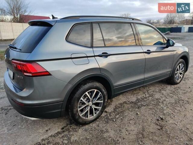 Серый Фольксваген Тигуан, объемом двигателя 1.98 л и пробегом 140 тыс. км за 17600 $, фото 1 на Automoto.ua