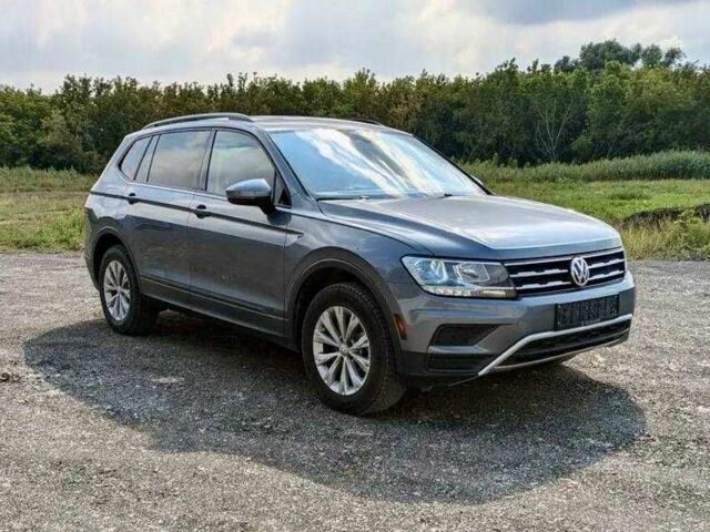 Серый Фольксваген Тигуан, объемом двигателя 2 л и пробегом 98 тыс. км за 9800 $, фото 2 на Automoto.ua