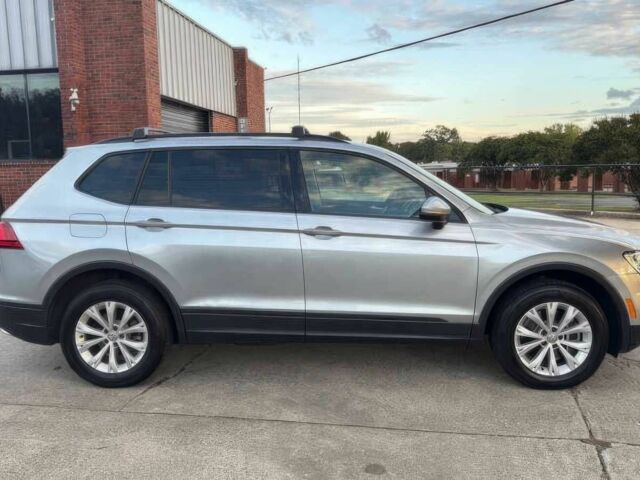 Сірий Фольксваген Тігуан, об'ємом двигуна 2 л та пробігом 34 тис. км за 12000 $, фото 3 на Automoto.ua