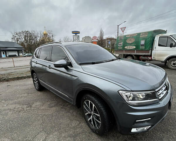Сірий Фольксваген Тігуан, об'ємом двигуна 1.98 л та пробігом 128 тис. км за 18700 $, фото 3 на Automoto.ua