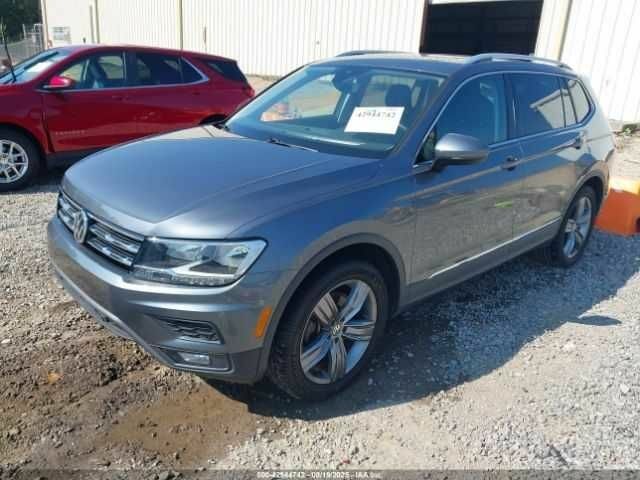 Серый Фольксваген Тигуан, объемом двигателя 2 л и пробегом 42 тыс. км за 5500 $, фото 1 на Automoto.ua