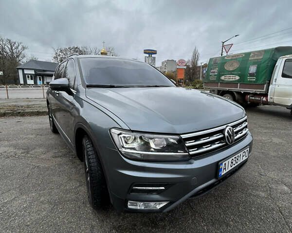 Сірий Фольксваген Тігуан, об'ємом двигуна 1.98 л та пробігом 128 тис. км за 18700 $, фото 2 на Automoto.ua
