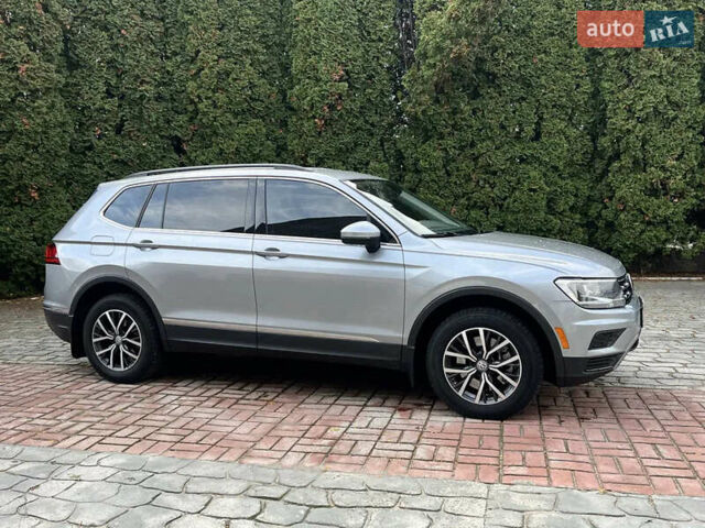 Серый Фольксваген Тигуан, объемом двигателя 1.98 л и пробегом 225 тыс. км за 17800 $, фото 2 на Automoto.ua