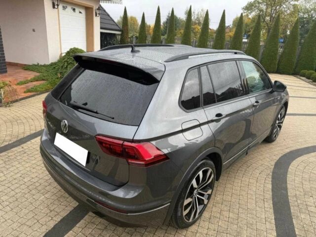 Сірий Фольксваген Тігуан, об'ємом двигуна 2 л та пробігом 55 тис. км за 19000 $, фото 3 на Automoto.ua