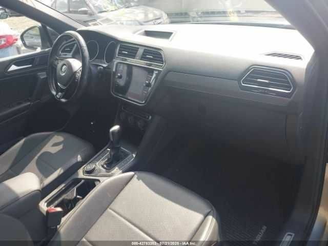 Сірий Фольксваген Тігуан, об'ємом двигуна 2 л та пробігом 32 тис. км за 4500 $, фото 4 на Automoto.ua